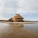 oval wood structure surrounded by water