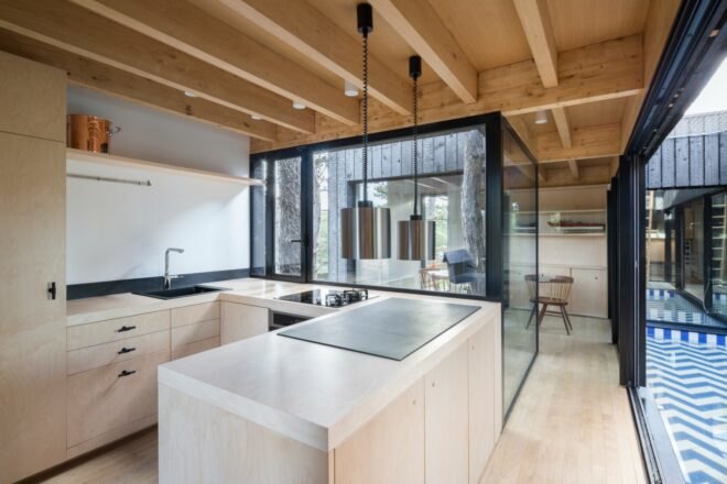 modern kitchen with exposed ceiling beams