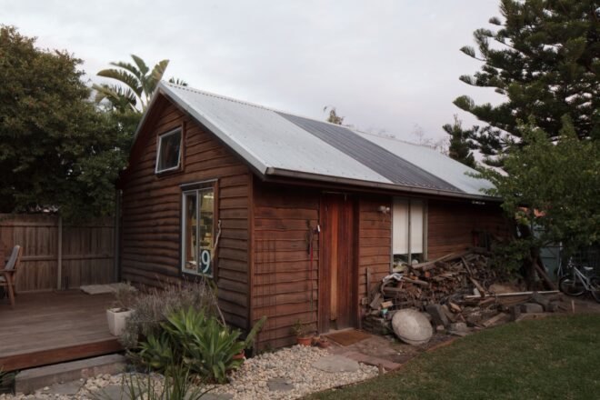 wood shed building with gabled roof