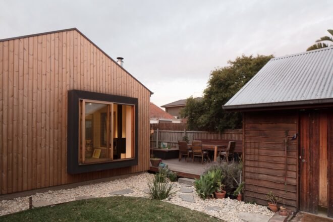 wooden buildings built beside a wood deck