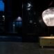 semi-translucent lamp above wood table