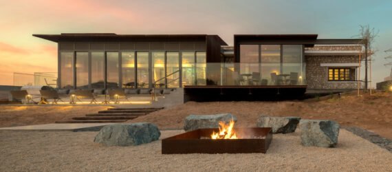 single-story building behind fire pit