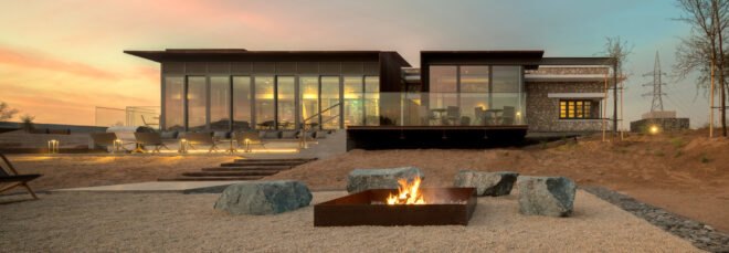 single-story building behind fire pit