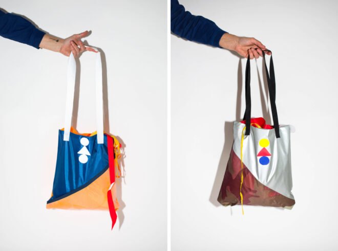 hand holding colorful bag made of recycled fabric