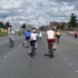 people biking on a highway