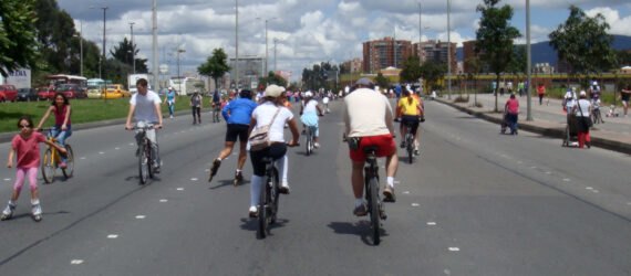 people biking on a highway