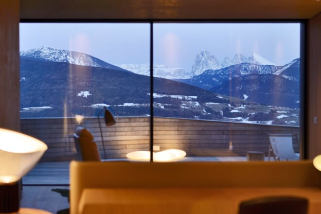 view of mountains from glass wall