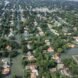 aerial view of homes in Houston flooded from hurricane
