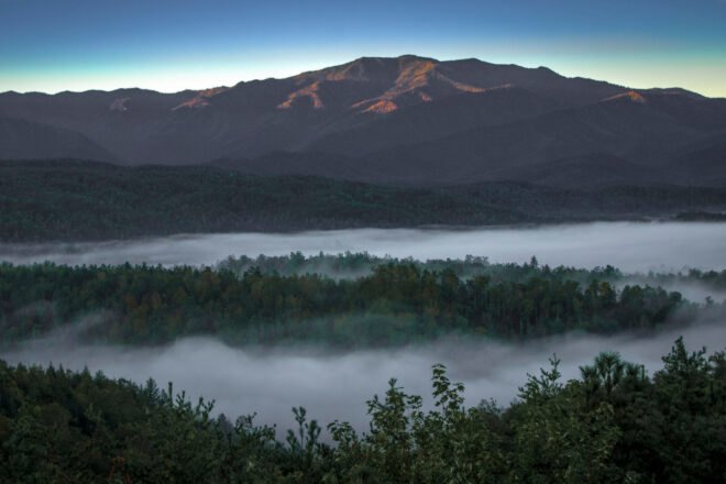 fog covering trees at base of mountains in Great Smoky Mountains National Park