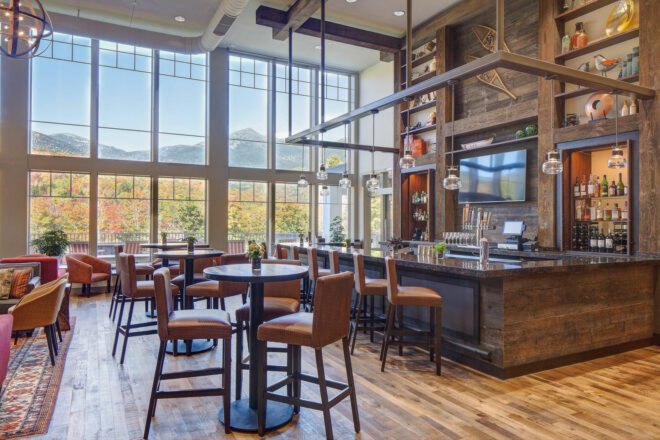 restaurant and bar area with wood and stone accents