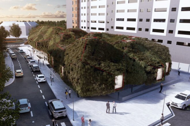 large elongated building covered in lush greenery