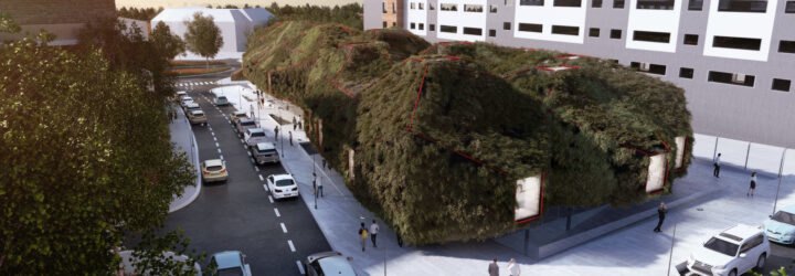 large elongated building covered in lush greenery