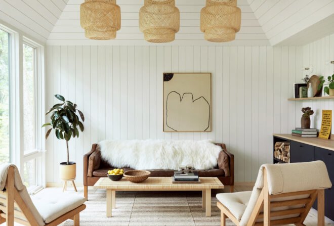 brown couch and tan chairs in white living room