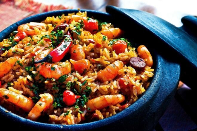 pot of rice, shrimp and peppers