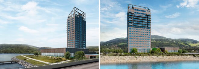 tall wood building overlooking hills and lake