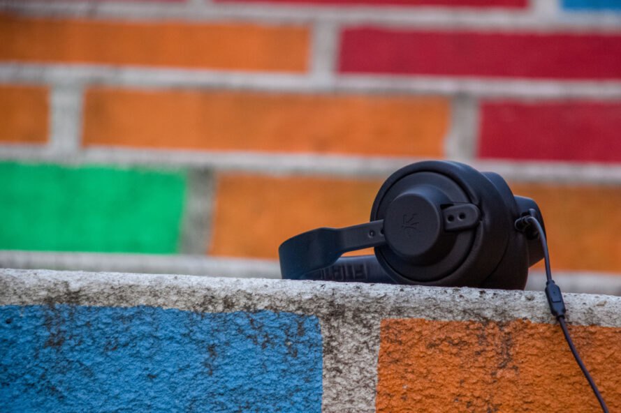 black headphones on colorful brick steps