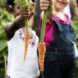 kids holding carrots