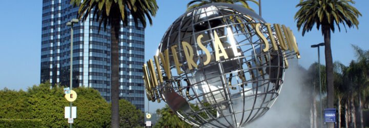 globe sculpture with UNIVERSAL sign in front