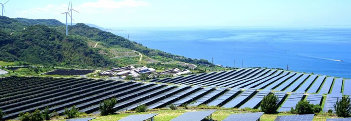 wind and solar energy being produced near ocean