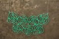 a green flower necklace