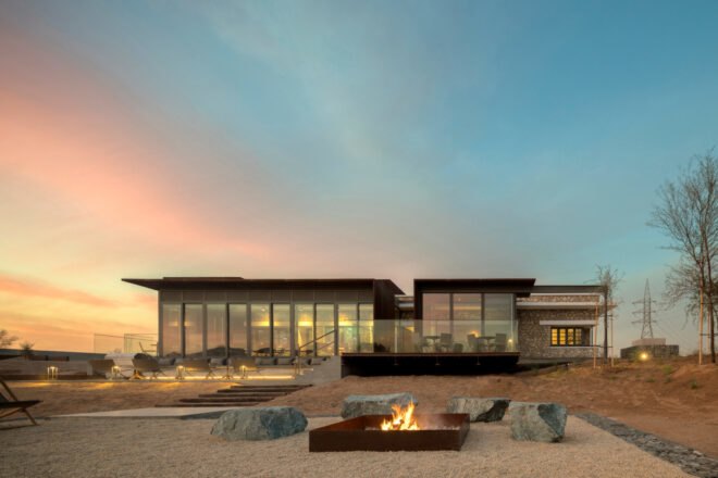 single-story building behind fire pit