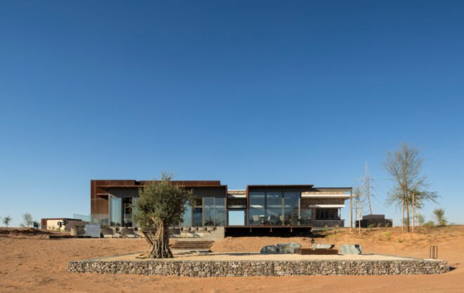single-story building in a desert landscape