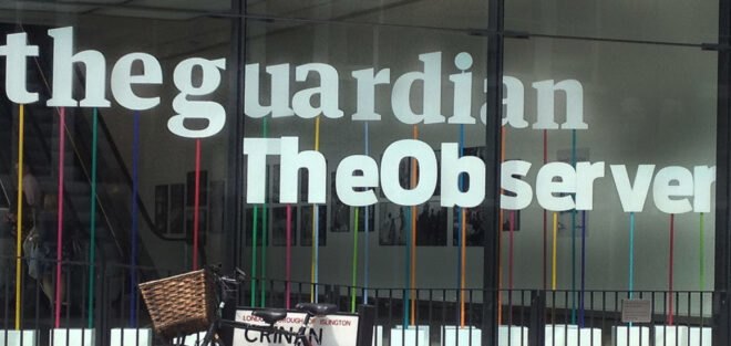 The Guardian building with bicycle outside of window
