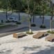 empty lounge chairs in a park
