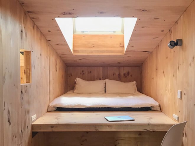 sleeping loft inside tiny cabin