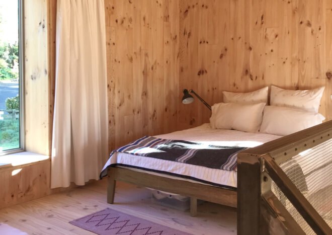 bedroom inside tiny cabin