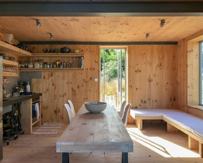 all wood living space with long dining table