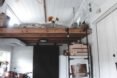 ladder leading up to sleeping loft in tiny home