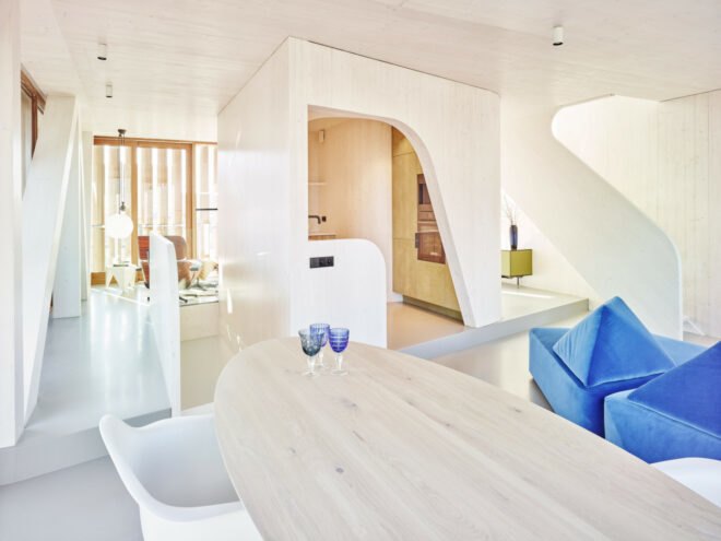 light-filled room with long wood table