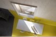 aerial view of dining table on yellow floor