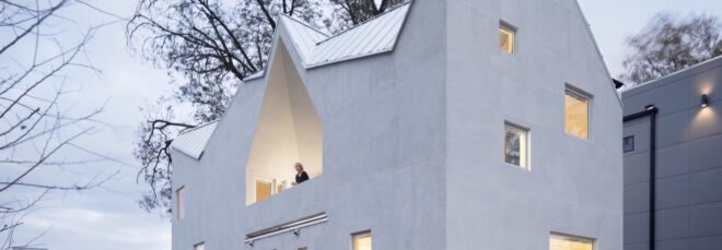 white house with multiple gabled roofs