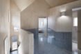 wood lined interior with geometric ceilings