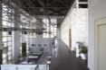 aerial view of warehouse interior with study tables and plants