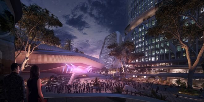 rendering of geometric building lit up by a purple light