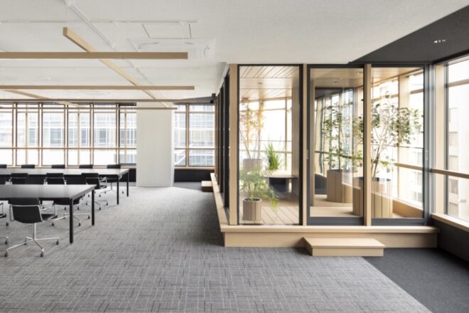 office space with glass-enclosed room