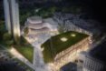 aerial view of trapezoid-shaped building with sloping green roof at night