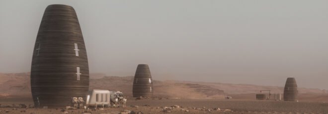 series of vertical round pod-like structures on desolate landscape