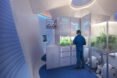person tending to indoor plants