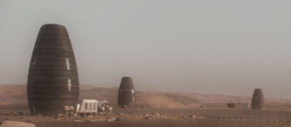 series of vertical round pod-like structures on desolate landscape