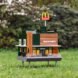Miniature McDonald's restaurant in a grassy field