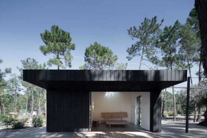 black cabin with wide opening