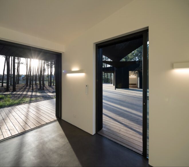 interior room with two large doorways leading outside