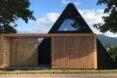 wooden slats in front of an A-frame building