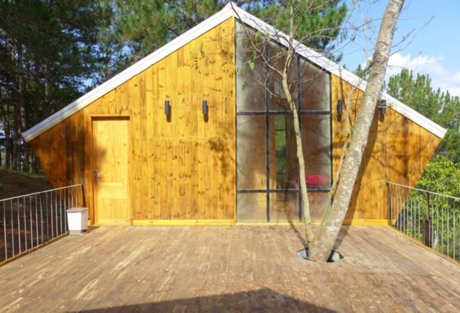 wood deck leading to wood cabin