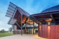 red clad building with modern form