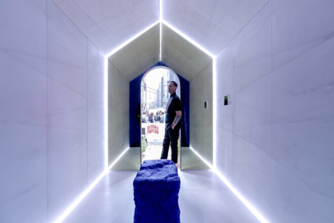 all white interior with man inside